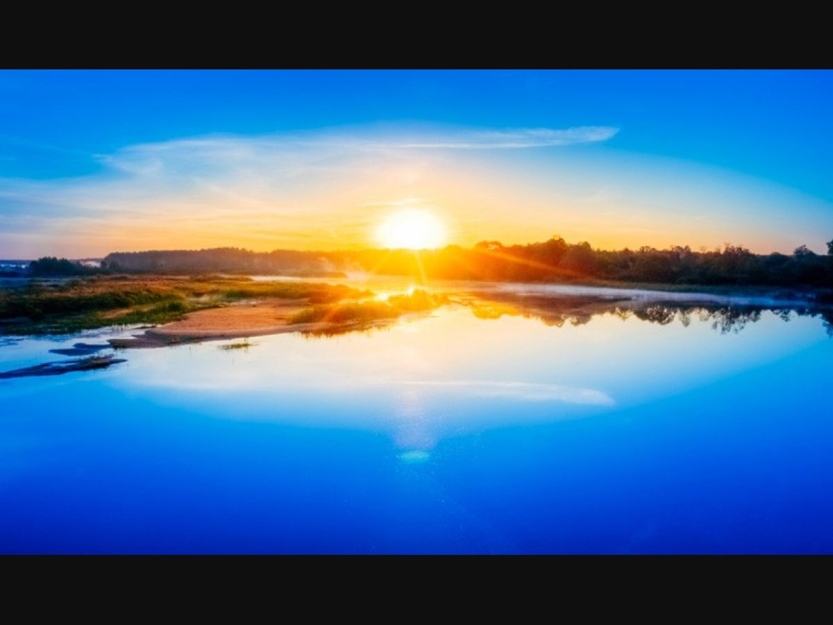 https://www.theweek.in/content/dam/week/news/2022/images/2023/2/17/water-sun-water-Beautiful-Russian-Lake-River-On-Sunrise-Sunset-shut.jpg.transform/schema-4x3/image.jpg