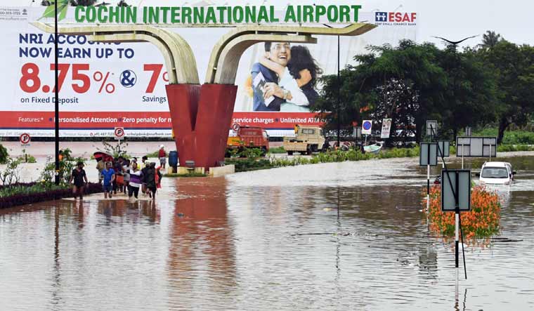 airport cochin international flood kerala road kochi india cial worsens modi friday state visit flooded wade leading through week