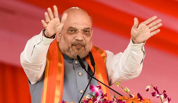 Amit Shah visits Siddaganga mutt, says Modi implementing Swamiji’s ...