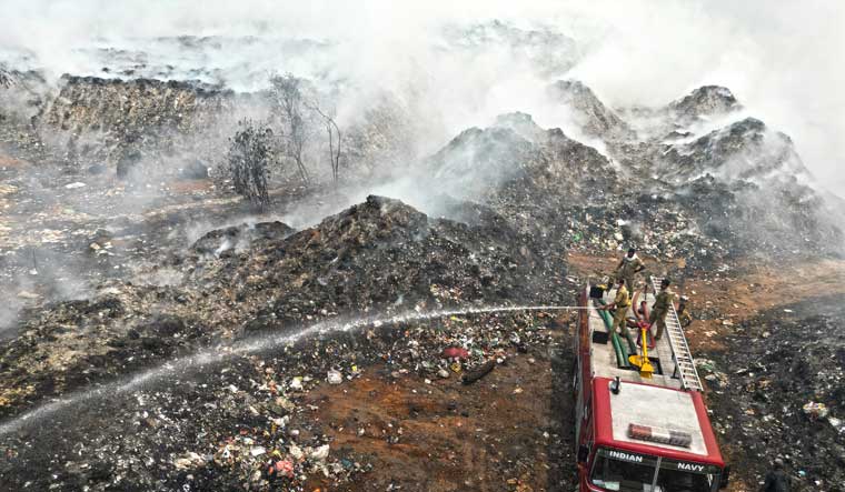 How a dumpyard fire in Kochi is leaving residents struggling to breath ...