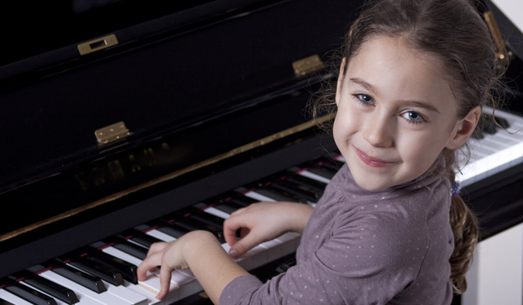 Playing the piano improves multisensory processing, keeps the blues at ...