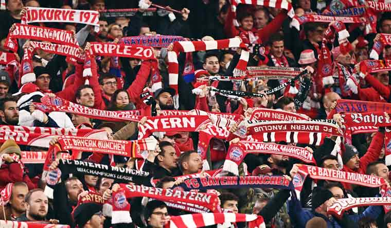 Bayern fans display huge banner protesting against club's ties to Qatar ...