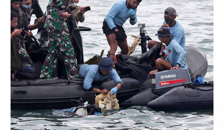 Body Parts Debris Found After Indonesia Plane Crash The Week 4128