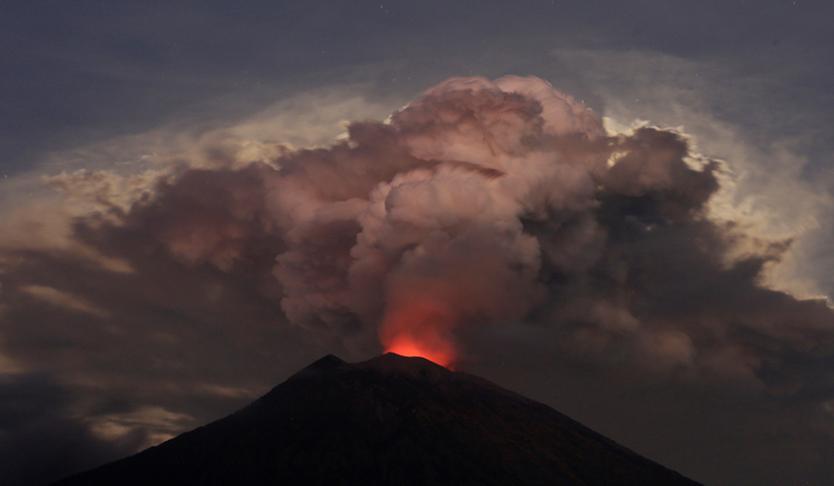 Ash from erupting volcano shuts airport in Indonesia's Bali - The Week