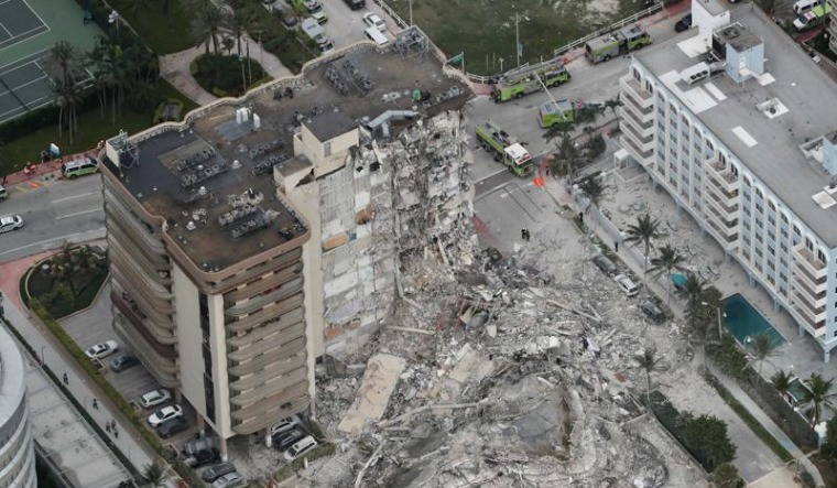 Florida building collapse: 1 dead, 99 still unaccounted ...