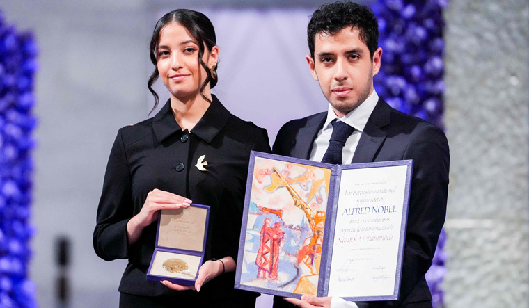 Twins Of Jailed Iranian Activist Narges Mohammadi Accept Nobel Prize On ...